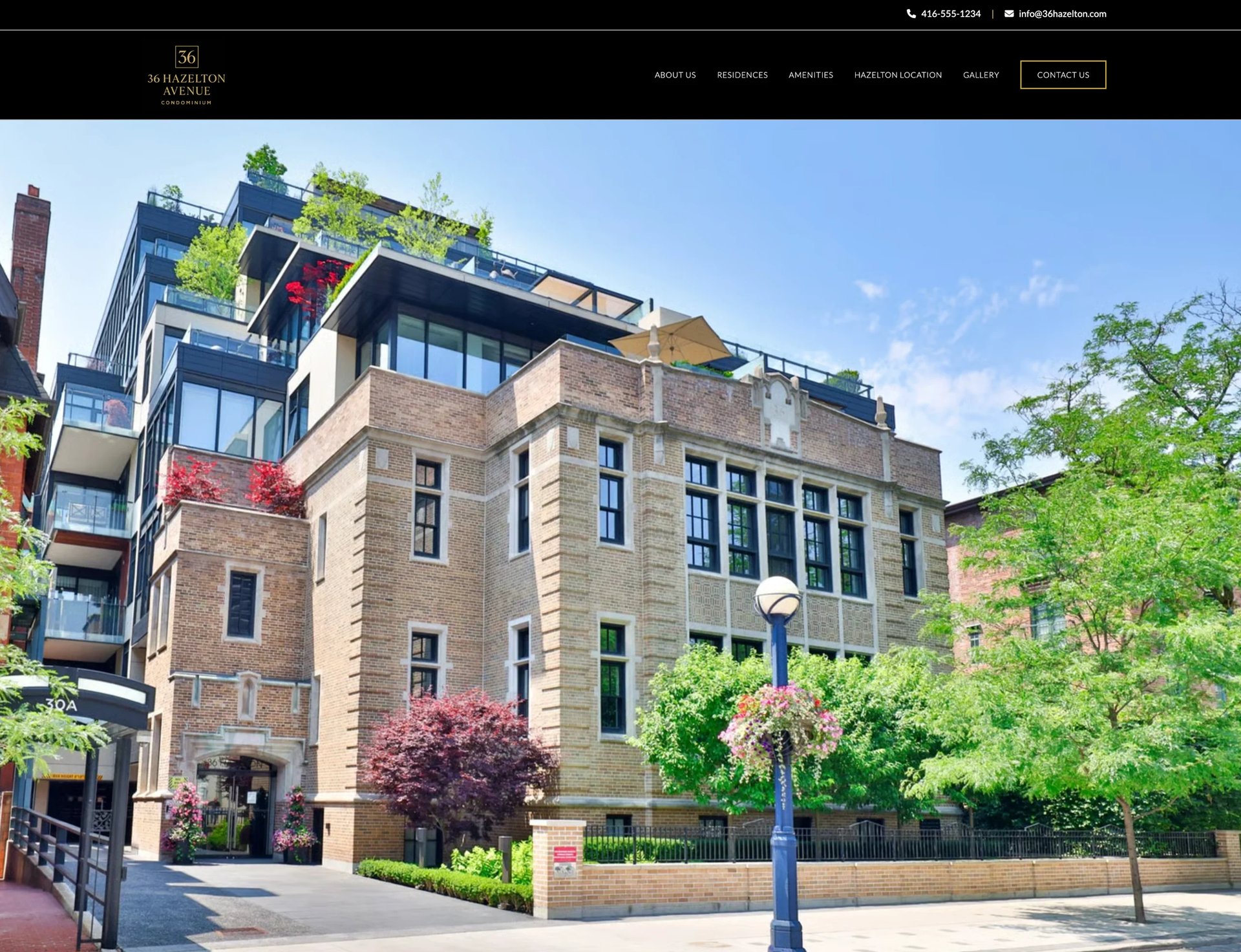 Modern residential building with mixed brick and stone facade, green rooftop garden, and landscaping on a tree-lined city street