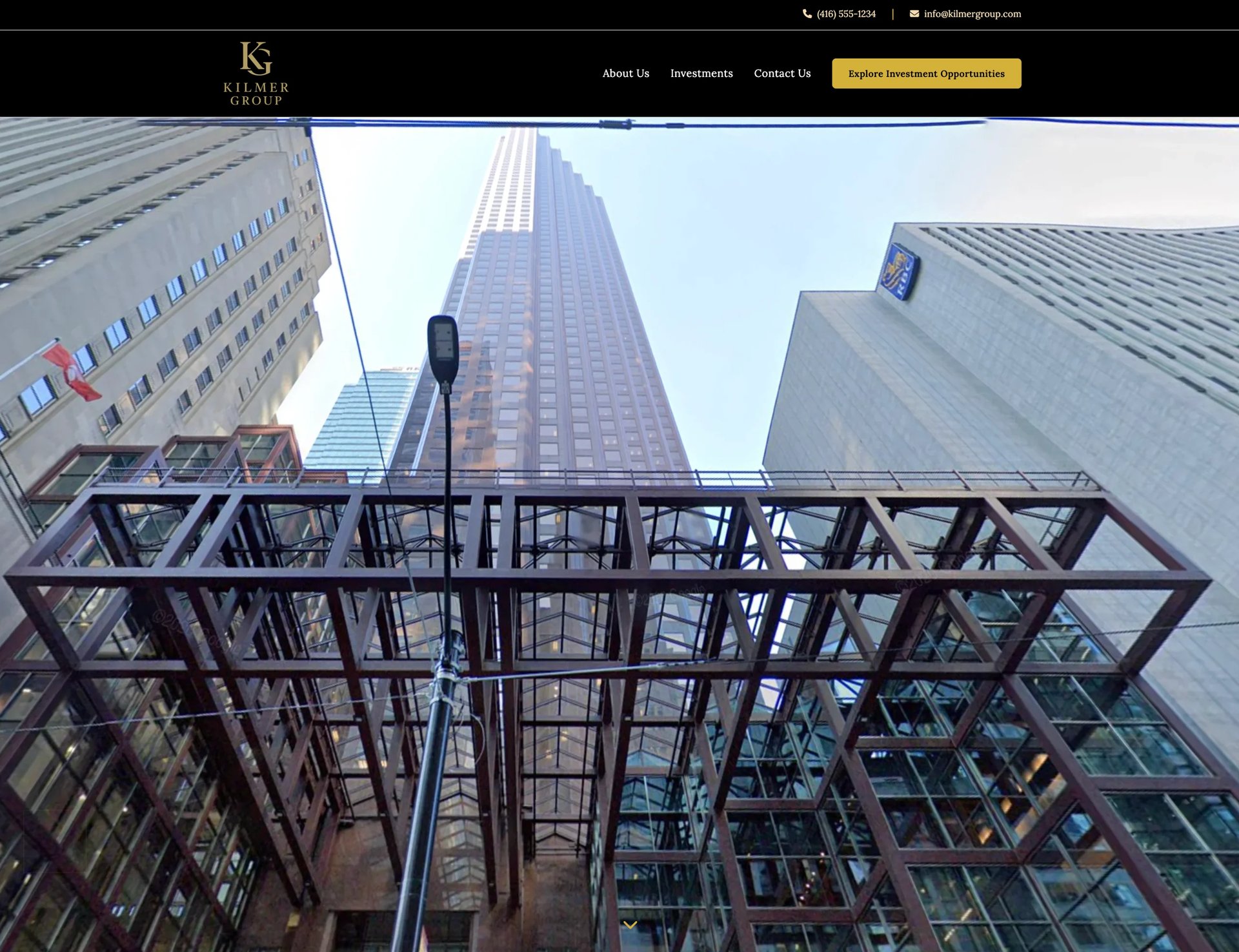 Looking up at Chicago skyscrapers from street level, with modern glass and steel buildings framing a metal sculptural structure in the foreground